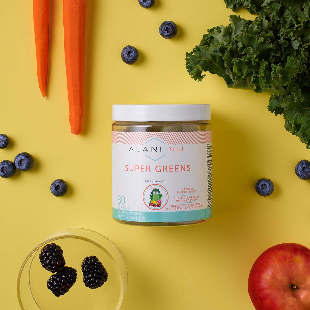 561324 Alani Nu Shop GNC for Alani Nu Super Greens a nutrient rich supplement powder and sneak